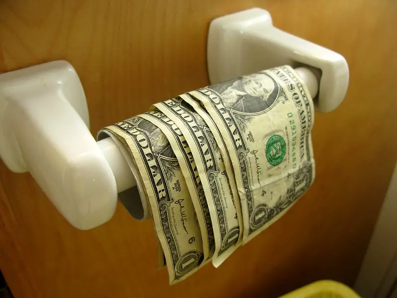 Dollar Bills on Toilet Paper Roll