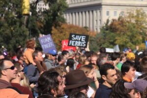 Save Ferris sign in a crowd