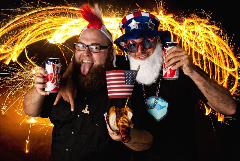 Budweiser fans with American Flag and fireworks
