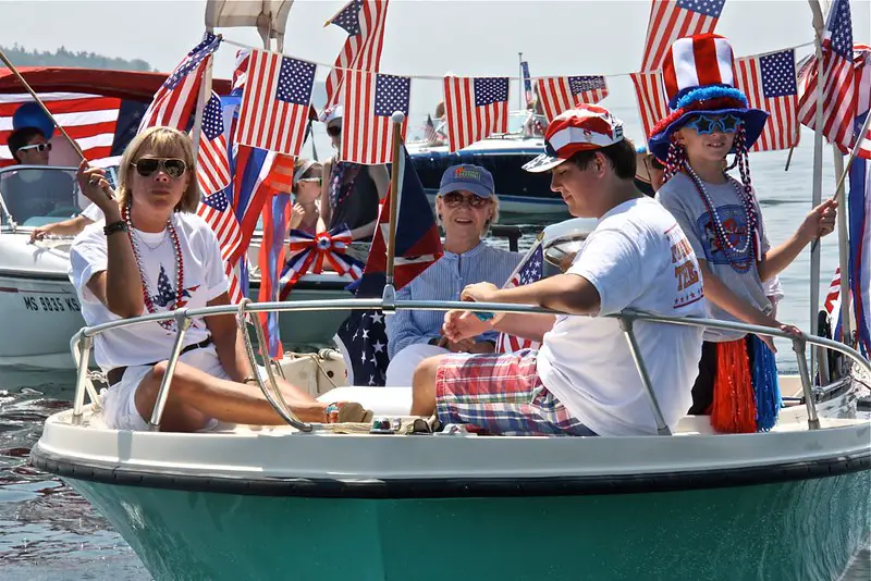 People on a Boat with American Flags