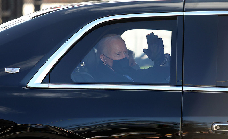 Biden in Mask in a Car Waving