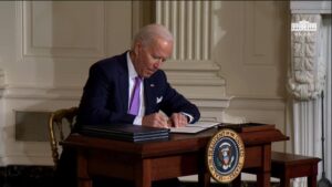 Biden Signing an Executive Order