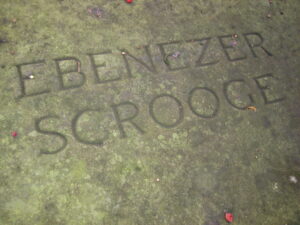 Ebenezer Scrooge written in stone