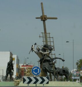 Don Quixote attacking windmill