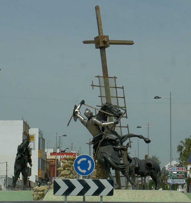 Don Quixote attacking windmill