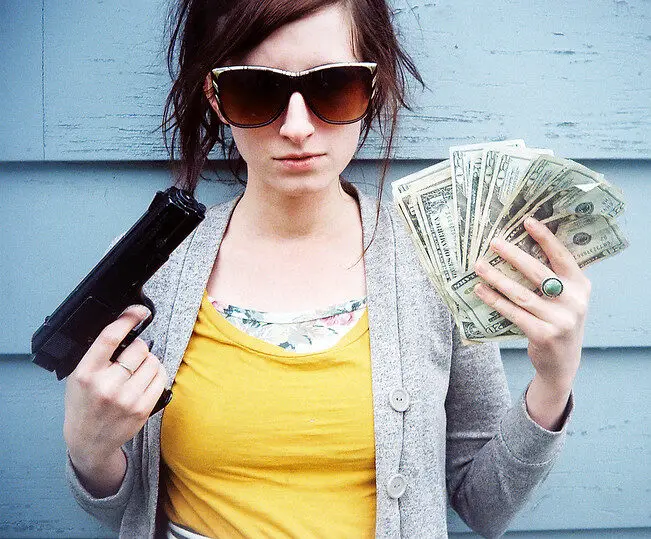 Woman with Gun Money