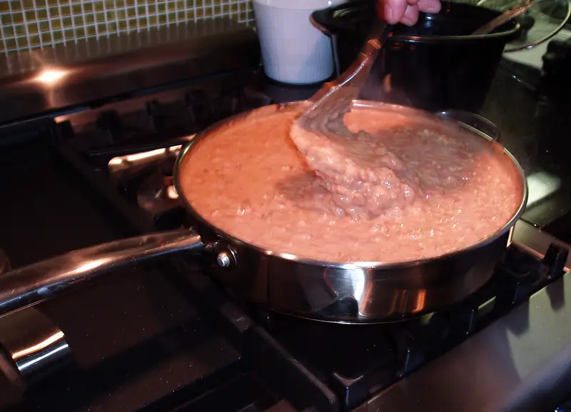 refried beans baking in a pot