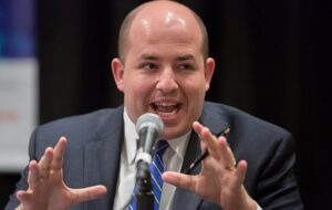 Brian Stelter with mic