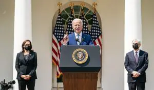 Biden dictating with Kamala and Garland in background