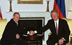 Putin and Bill Clinton Shaking Hands